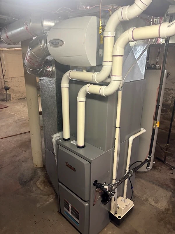 Furnace and connected air distribution equipment at a residential property
