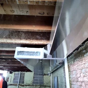 Installed metal ductwork in a building interior