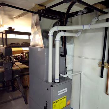 Furnace and connected heating system piping